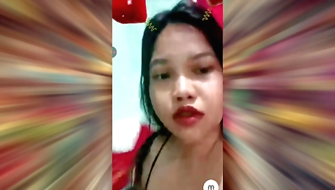Cute girl with black hair is talking in a whisper video