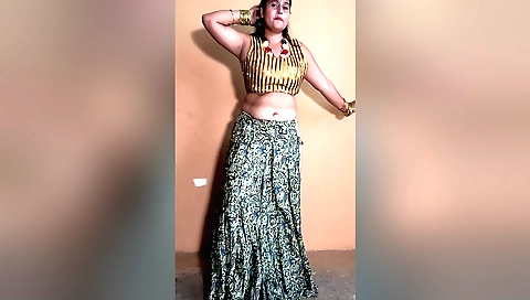 Indian babe shows her big breasts dancing with a big dick