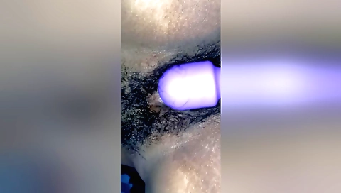 Hairy indian teen masturbates with a toy on her hairy pussy