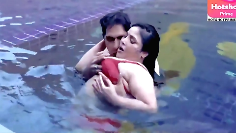 Indian milf in sexy red dress fucks with a big dildo