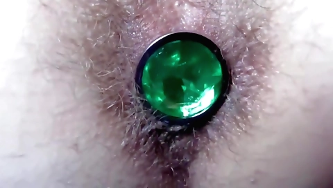 Busty amateur girl with a large butt plug fucks her ass