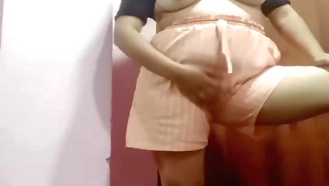 Busty brunette in sexy pantyhose is naked on webcam