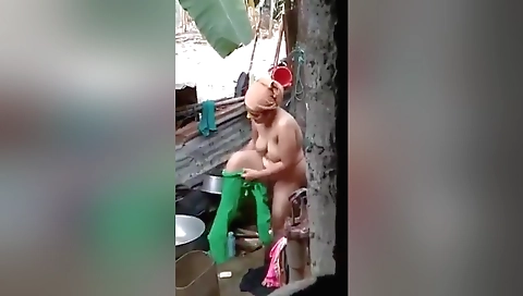 Indian brunette in a nude video in the sun outdoor setting