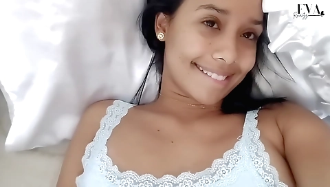 Beautiful girl in a shower takes a moment for herself