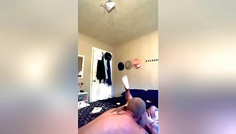 Big ass brunette with a nice round booty is fucking on his lap
