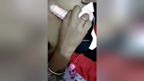 Solo female sucking and playing with dildo on webcam video