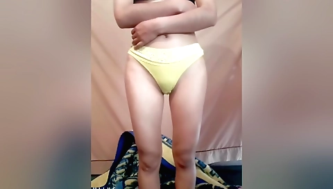 Busty girl in a white blouse and black t-shirt in a solo porn video