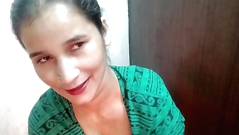 Indian chick wearing a black dress is alone in her home