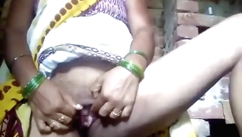 Solo girl fingers and masturbates in her red saree