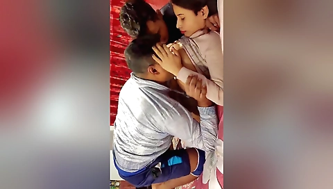 Indian teen and a guy in front of a webcam doing threesome