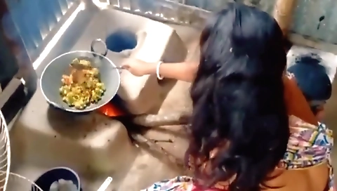 Amateur indian brunette housewife video in the kitchen