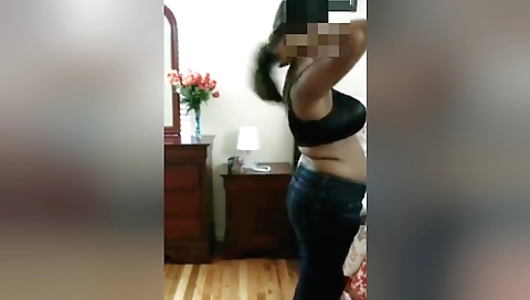 Indian babe is wearing a sexy dress and is changing it